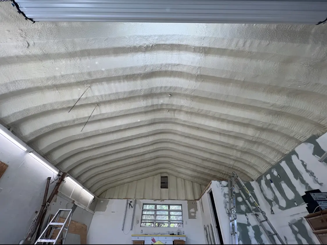 Spray polyurethane foam applied to the underside of a metal roof deck in New Cumberland